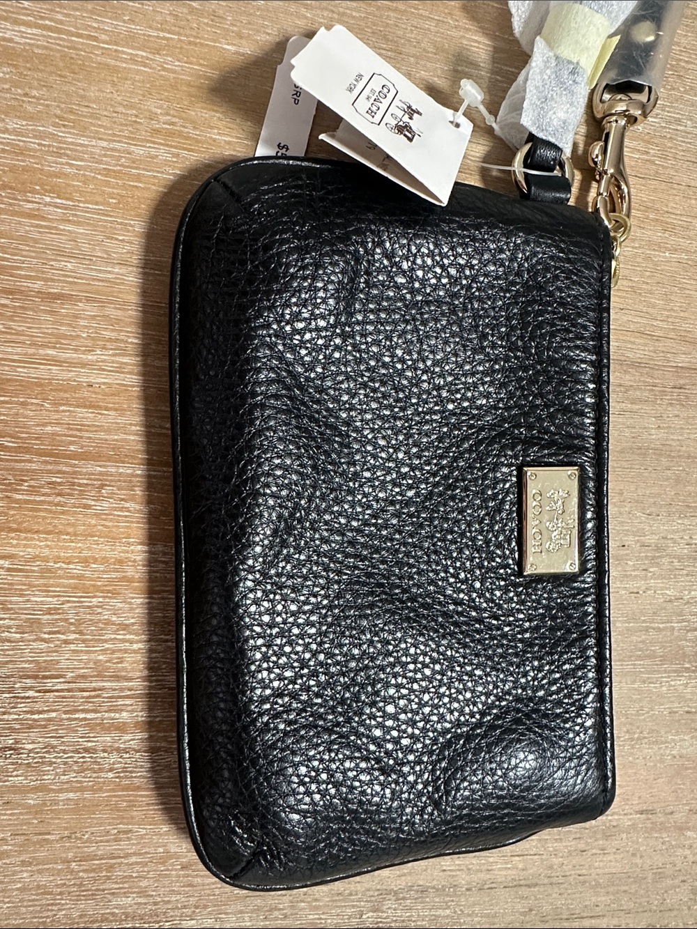 Coach Black Pebbled Leather Zip Wristlet with Gold Plaque